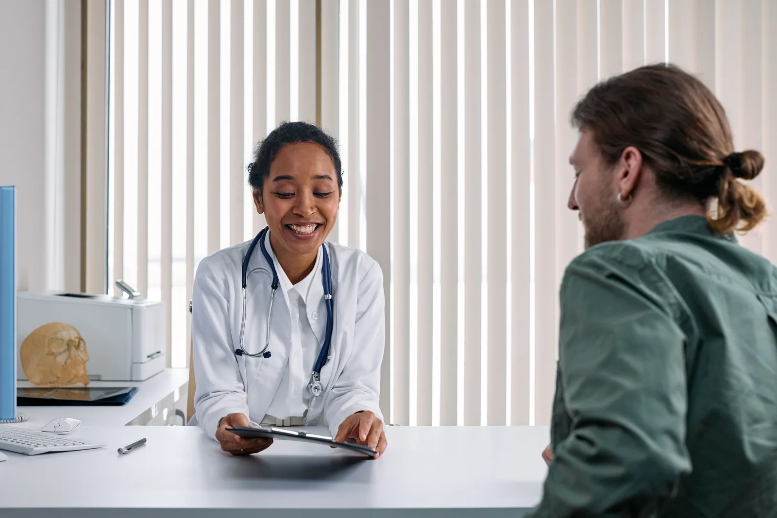 Doctor reviewing care information with a patient